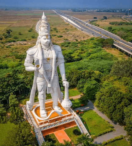 Devotees worshipping Lord Hanuman at a temple during Hanuman Jayanti