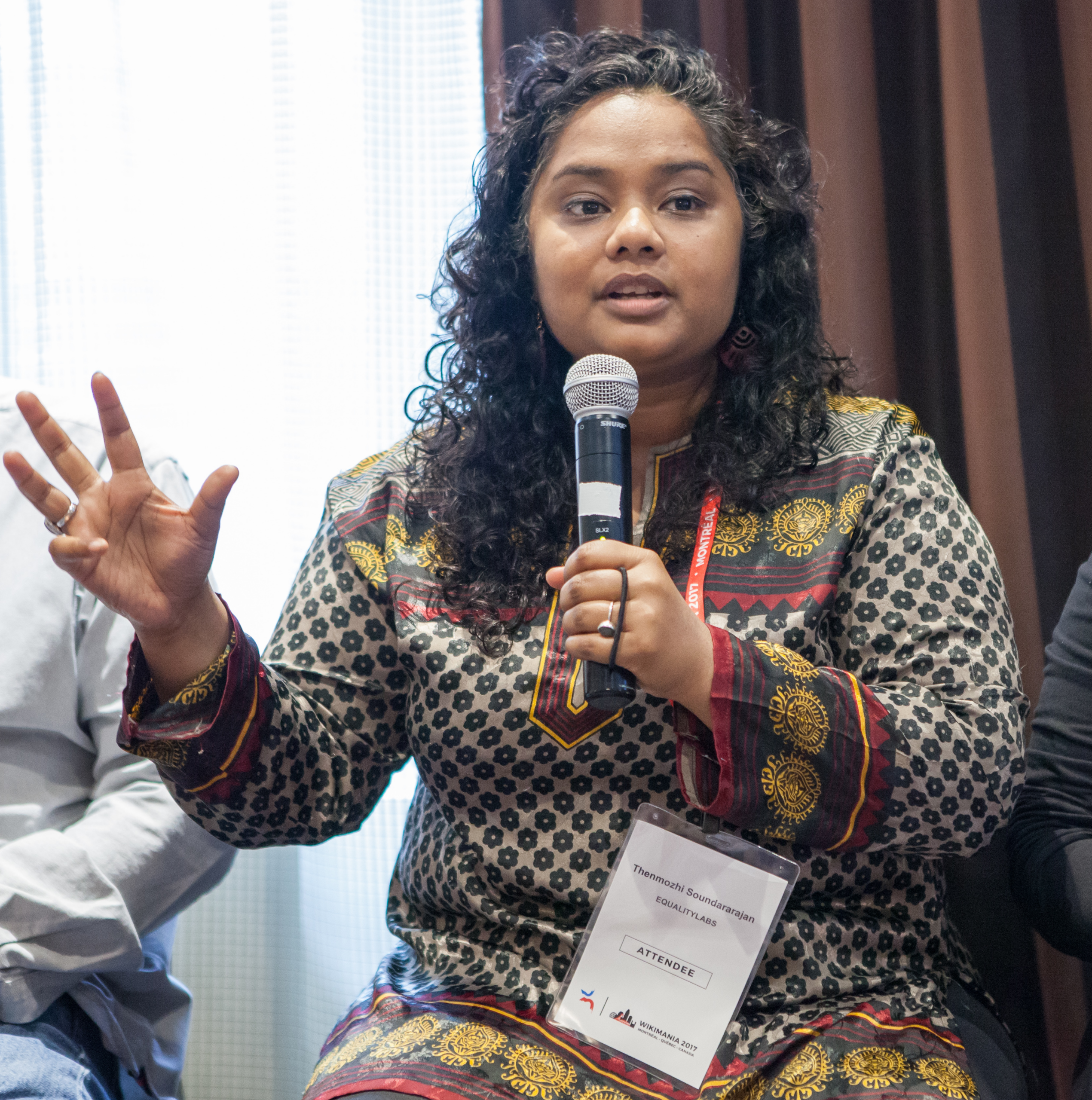 Thenmozhi Soundararajan speaking at a public event on caste and social justice