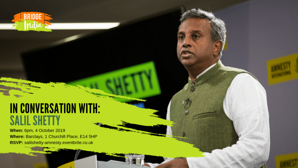 Civil society leader speaking at a public event in Bengaluru