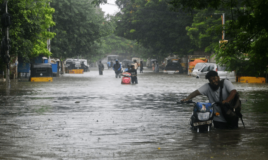 Intense rainfall in Chennai city showing waterlogged roads and daily commuter struggles