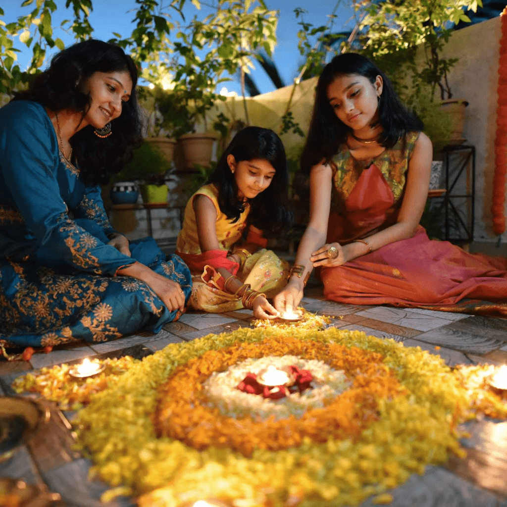 Family celebrating Holi together at home across generations